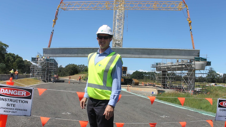 Man in high-vis vest on construction site