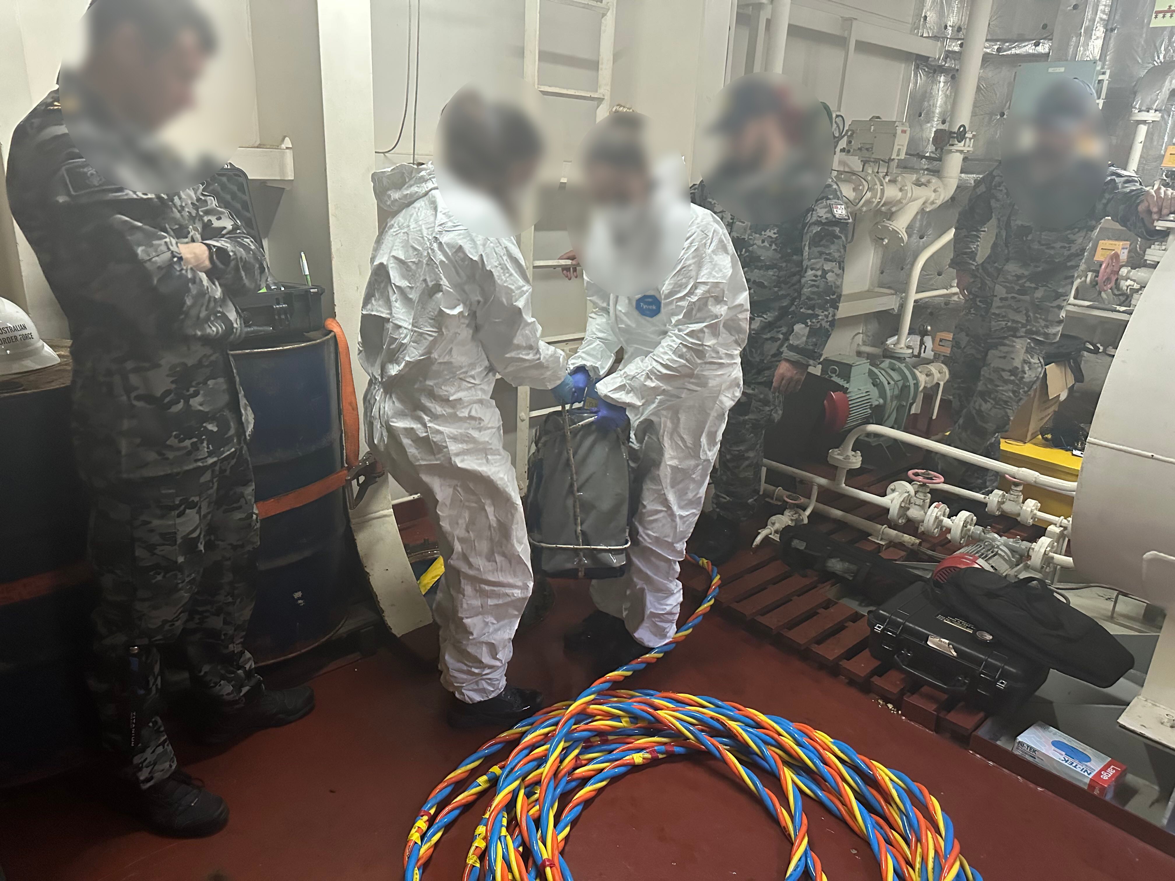 Three men charged over alleged plot to smuggle 800kg of cocaine into