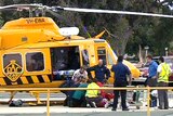 Rescue workers load toddler, fatally injured on Rottnest, onto helicopter