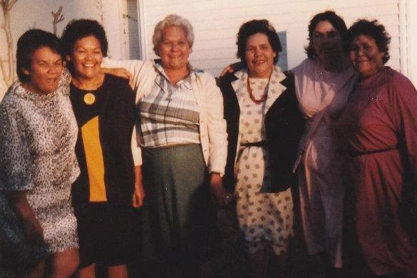 Aunty Lorraine (in black and yellow dress) and with four of her sisters and a niece.