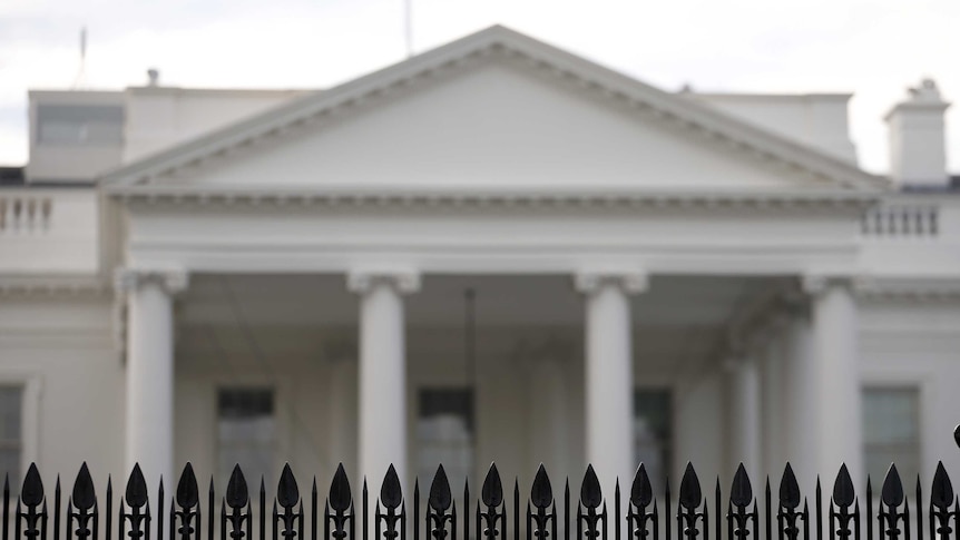 Security fencing with added spikes is seen at the White House.
