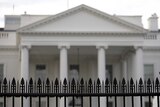Security fencing with added spikes is seen at the White House.