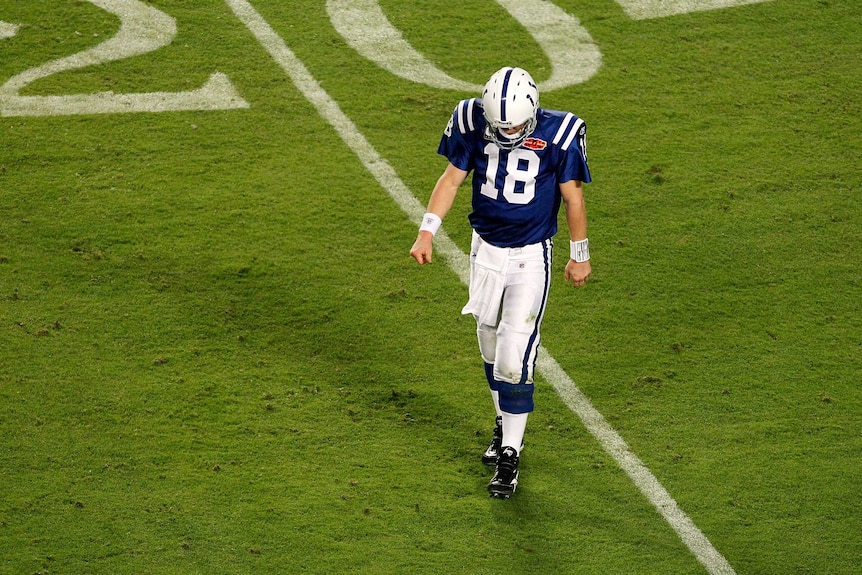 Indianapolis Colts' Peyton Manning reacts as he walks off the field in Super Bowl 44.
