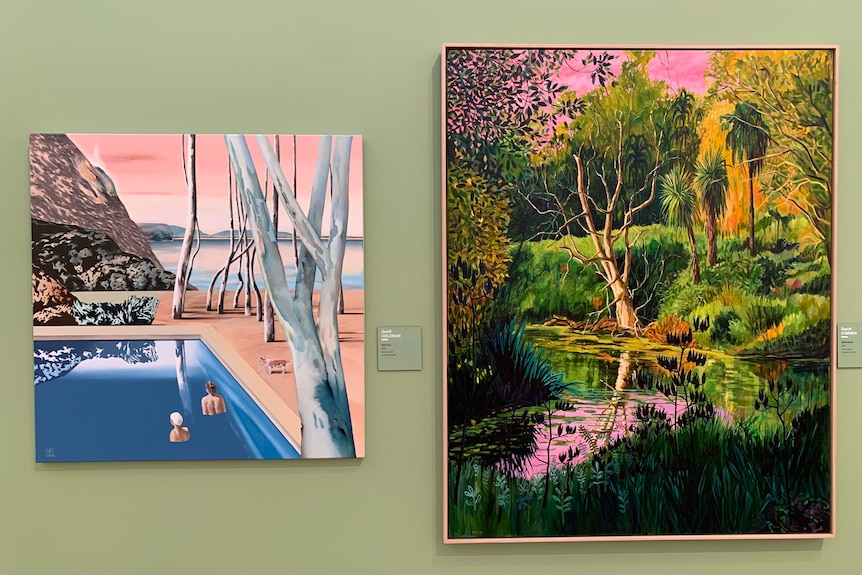 two colourful paintings on a wall depicting a swimming pool and a lagoon 