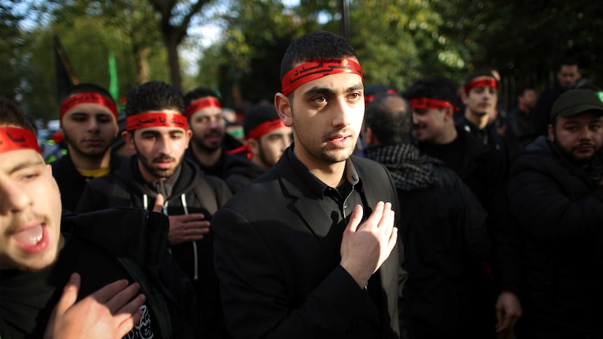 Shia Muslims take part in an Ashura day mourning procession on November 14, 2013 in London, England.