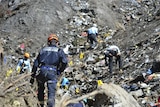 A Gendarme works at the Germanwings crash site