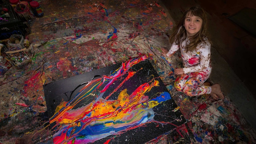 Child prodigy Aelita Andre with her painting.