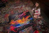 Child prodigy Aelita Andre with her painting.