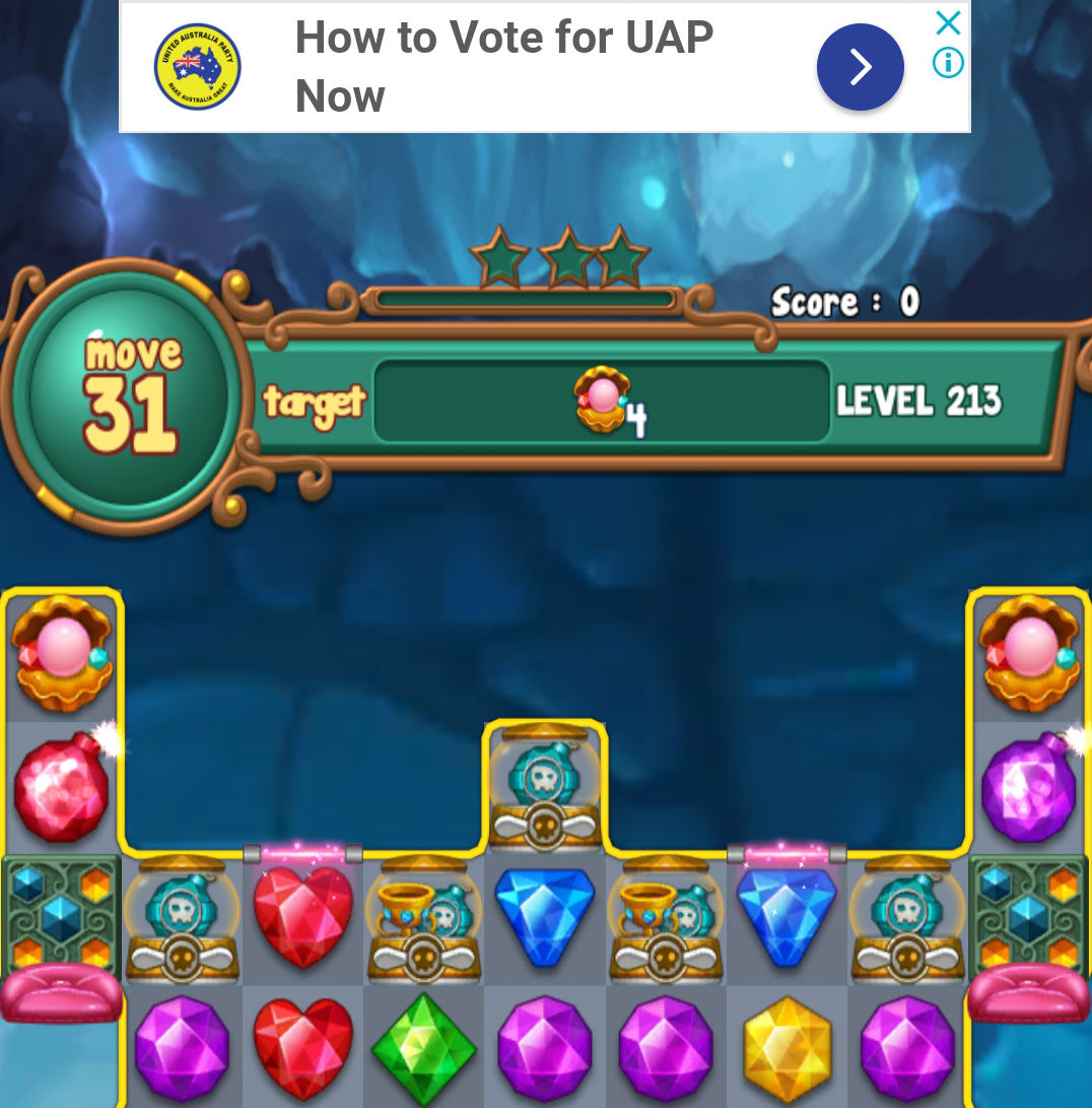 A screenshot of a jewel-based mobile game, with a banner ad for the UAP.