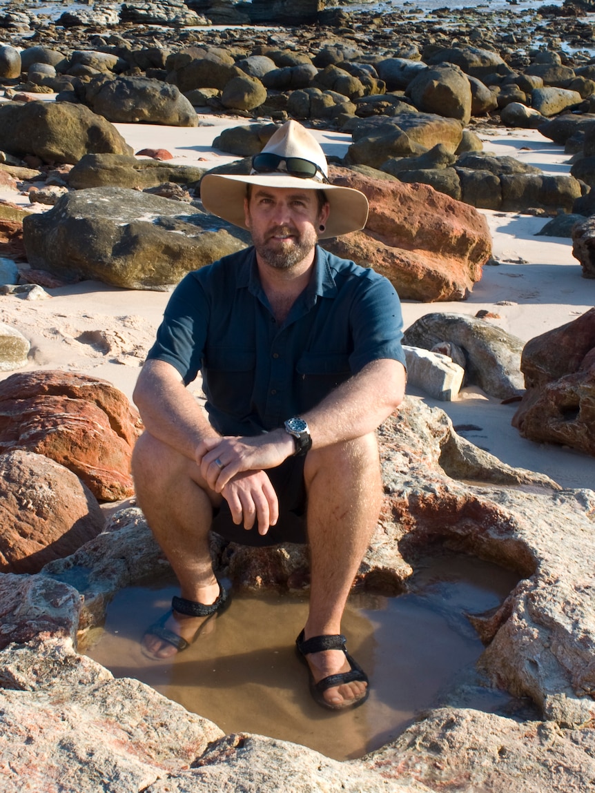 Steve Salisbury with a sauropod track