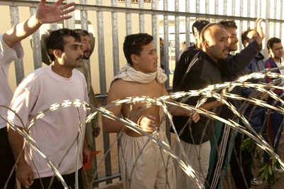 File photo: Afghani asylum seekers at Woomera (Getty Images: Tony Lewis)