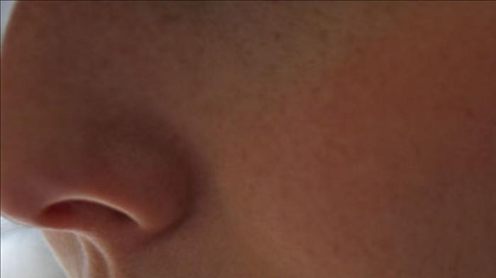 Call centre woman with headset, close up, generic