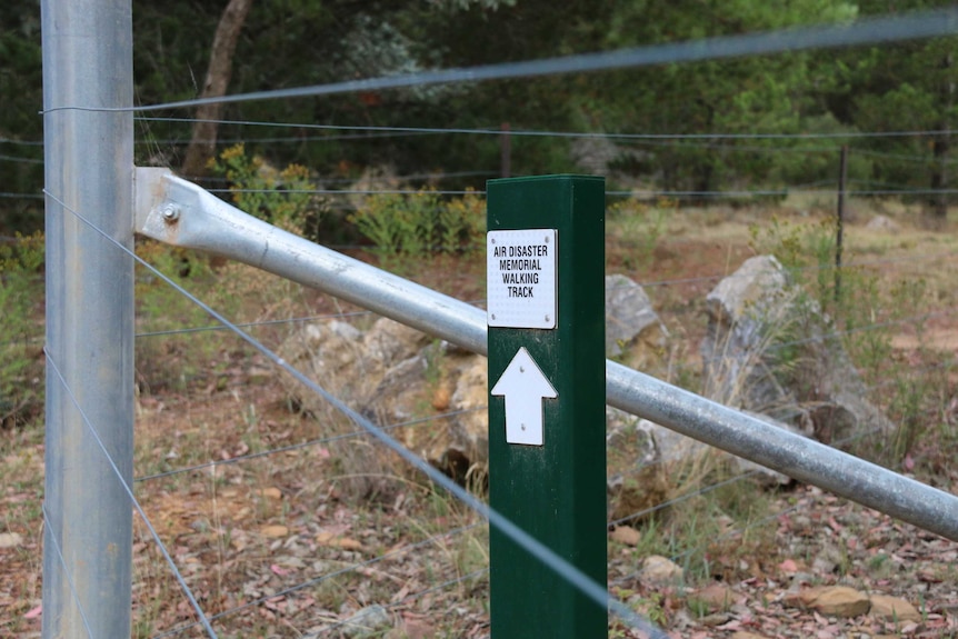 A sign marks the start of the Air Disaster Memorial walking track.