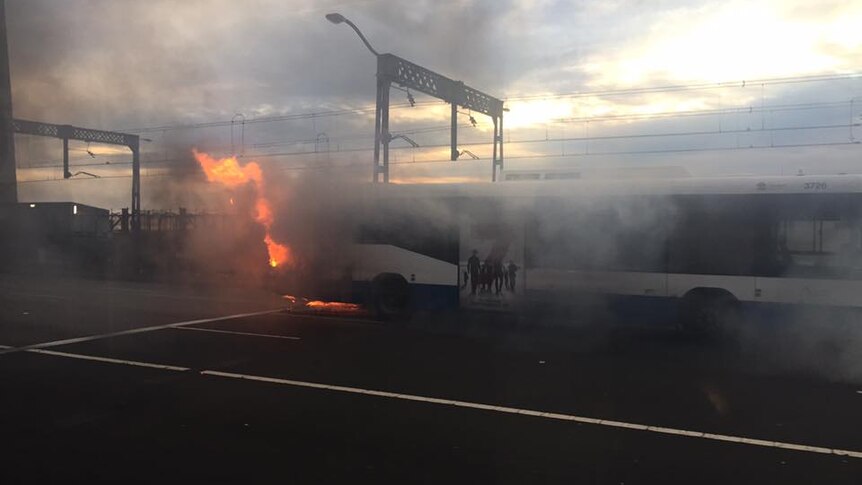 A bus on fire.