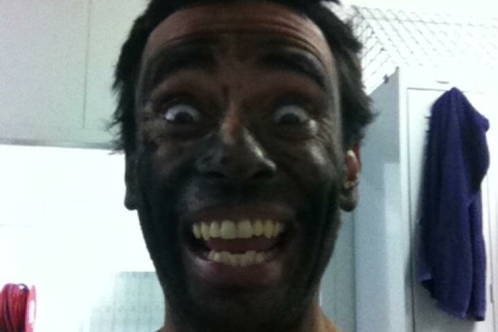 Sam Stefanaras posing got the camera with his face covered in coal dust after working a shift at the mine