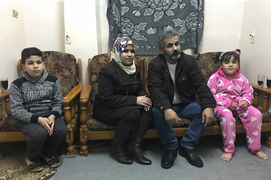 Saeed Tabaza, a third generation Palestinian refugee, with his family.