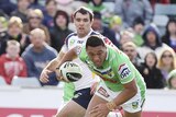 Josh Papalii breaks through Cowboys defence at Canberra Stadium on July 7.