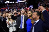 Trump's adult children smile and pump their fists in the air at the Republican National Convention