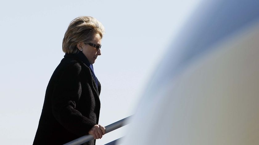 Hillary Clinton boards her plane
