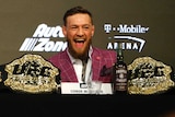 Conor McGregor is all smiles during a press conference ahead of his fight with Khabib Nurmagomedov at UFC 229