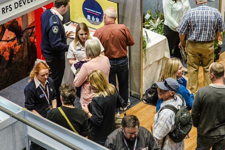 people look at stalls at the exhibition