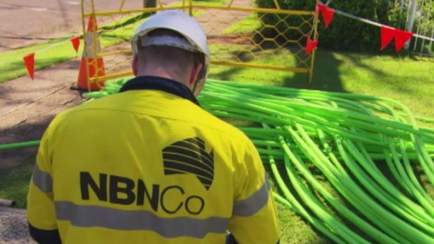 An NBN Co installer with fibre cable