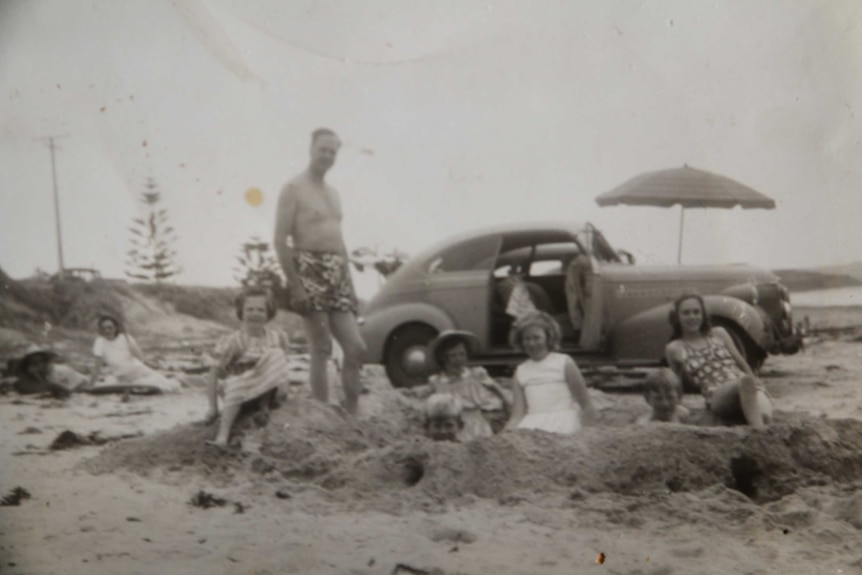 The Holden family at the beach.