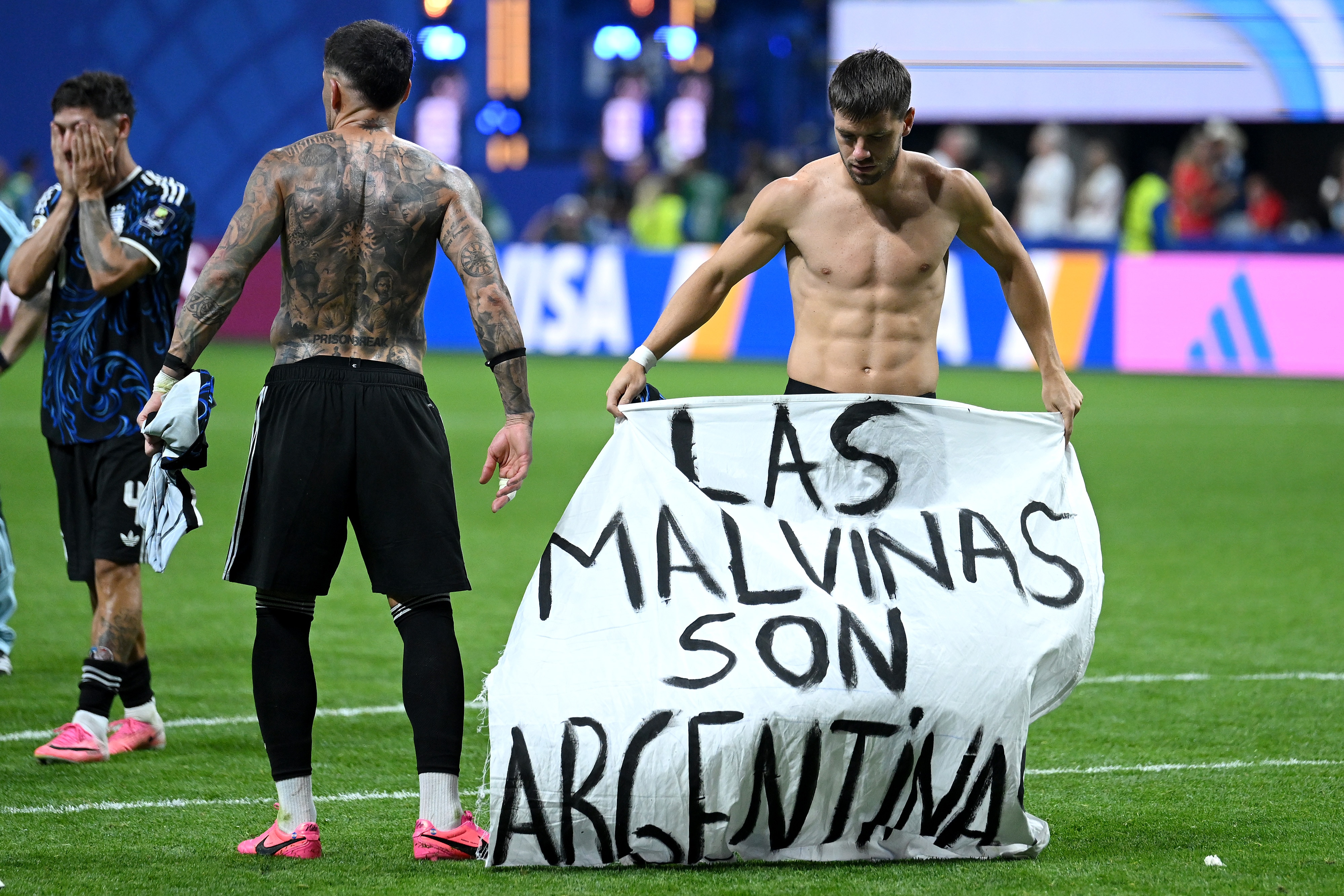 Argentina stars hold up Falklands banner after World Cup win over England