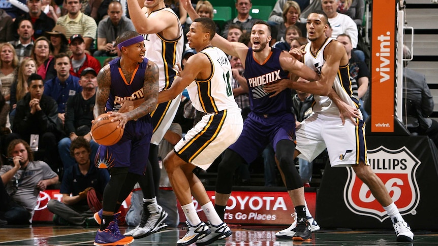Exum hassles the Suns