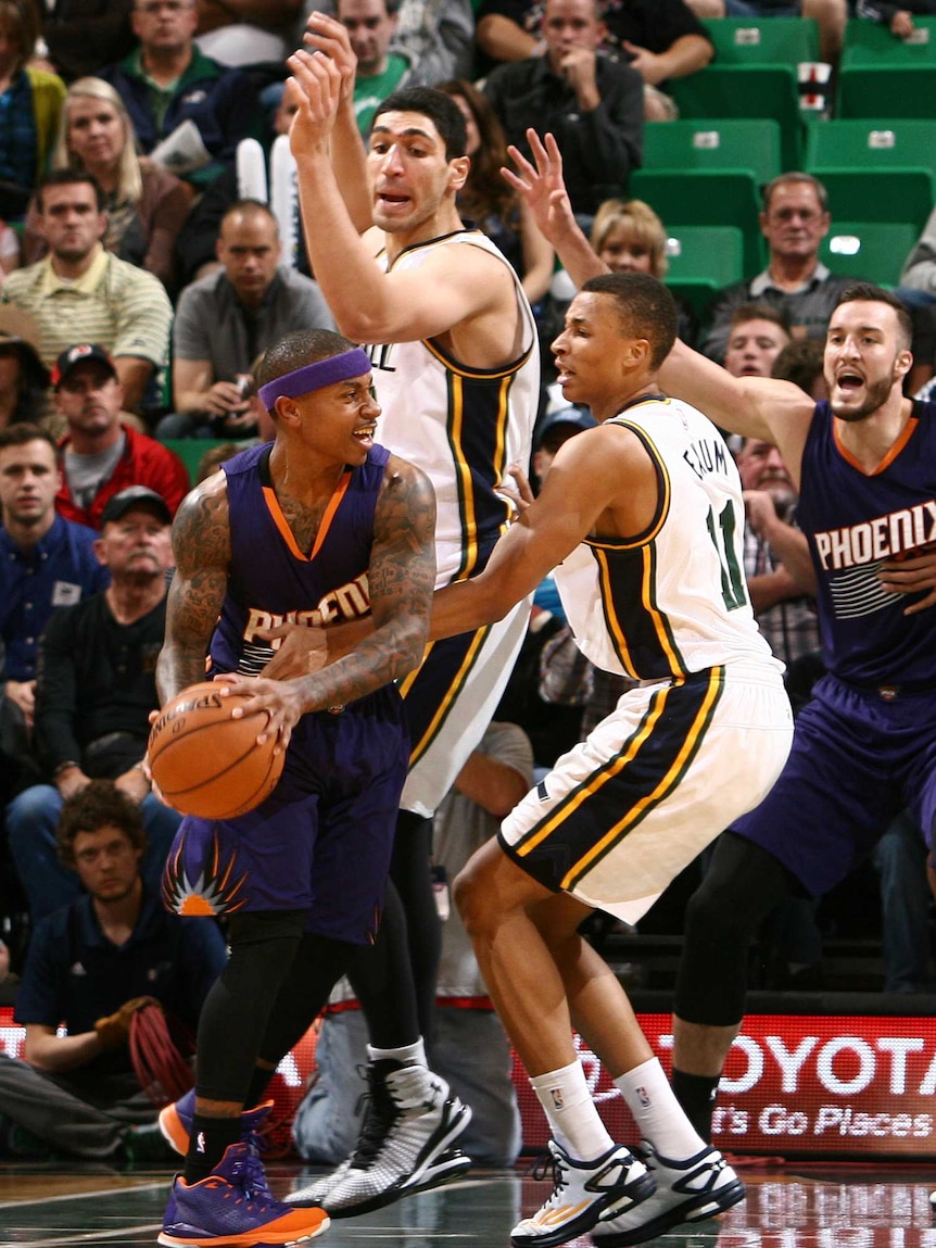 Exum hassles the Suns