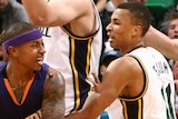 Exum hassles the Suns