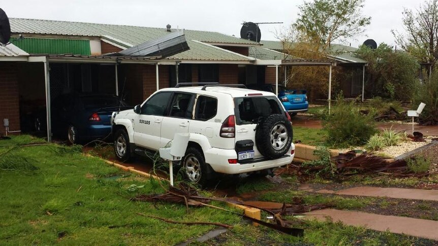 Wickham cyclone damage to car and homes