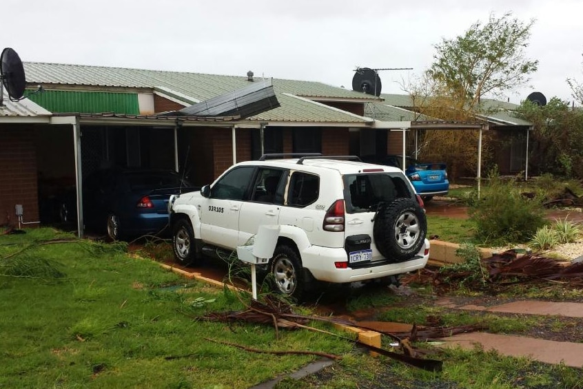 Wickham cyclone damage to car and homes