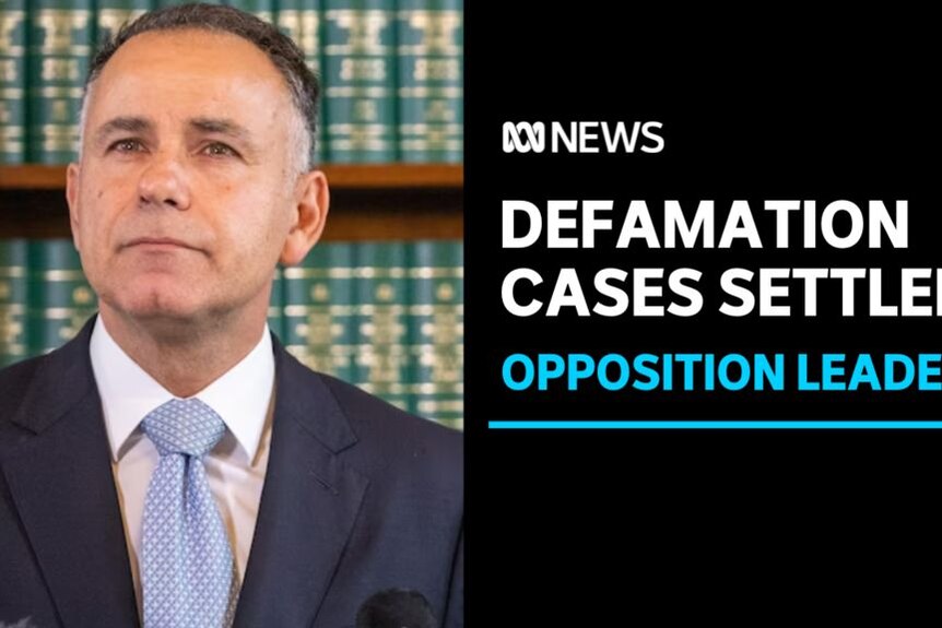 Defamation Cases Settled, Opposition Leader: John Pesutto in a suit with a neutral stare standing in front of a bookcase