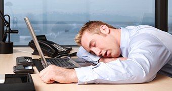 Man asleep at his desk