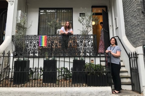Case manager Jenny Holmes, volunteer coordinator Bec Fitzgerald and executive manager Nicole Yade stand outside Lou's place