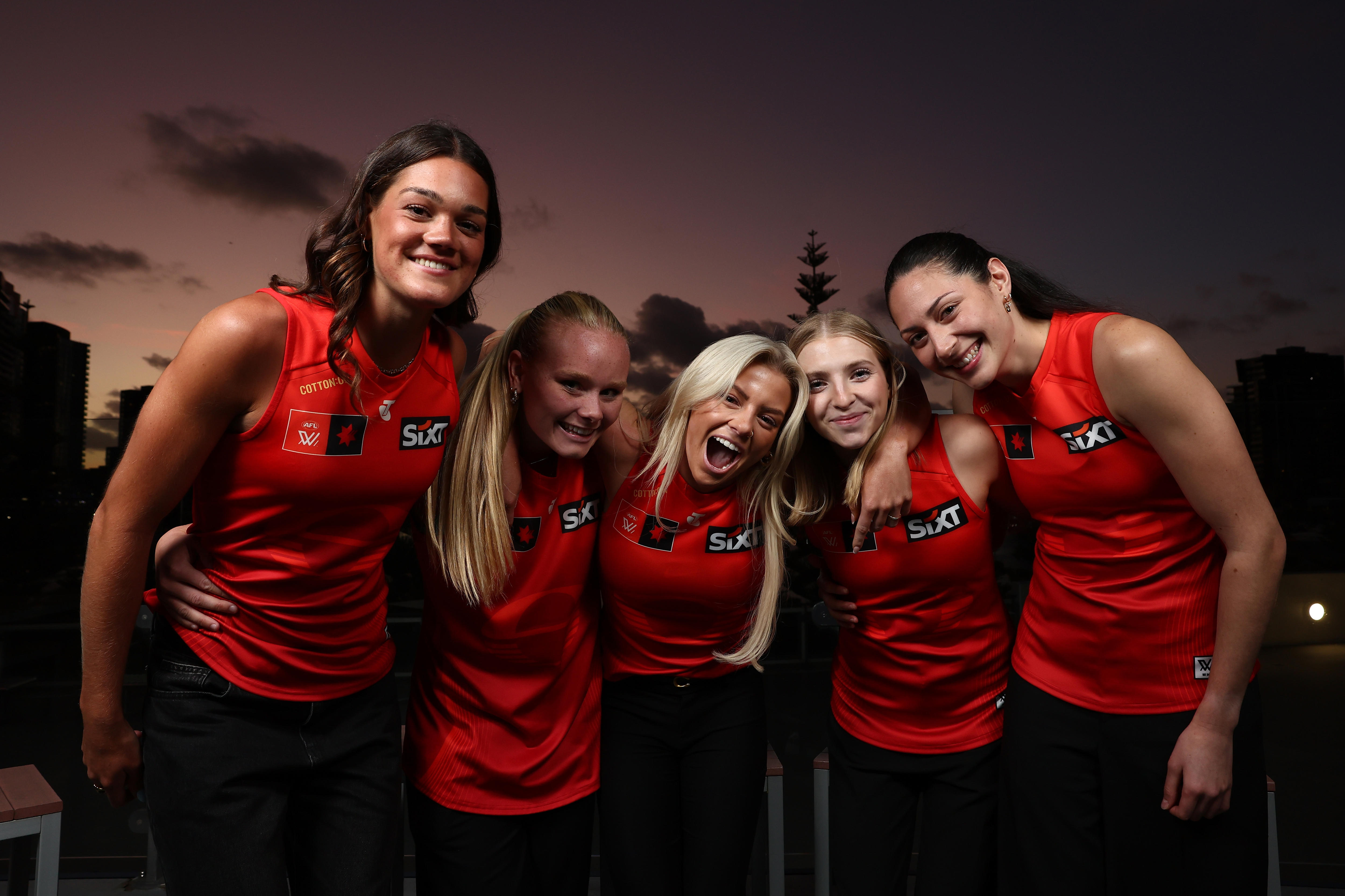 Suns complete stunning AFLW draft raid as Tigers take power forward