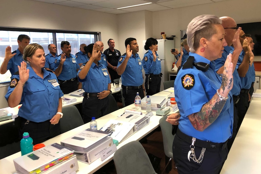 Prison officers taking oath of engagement, being sworn in