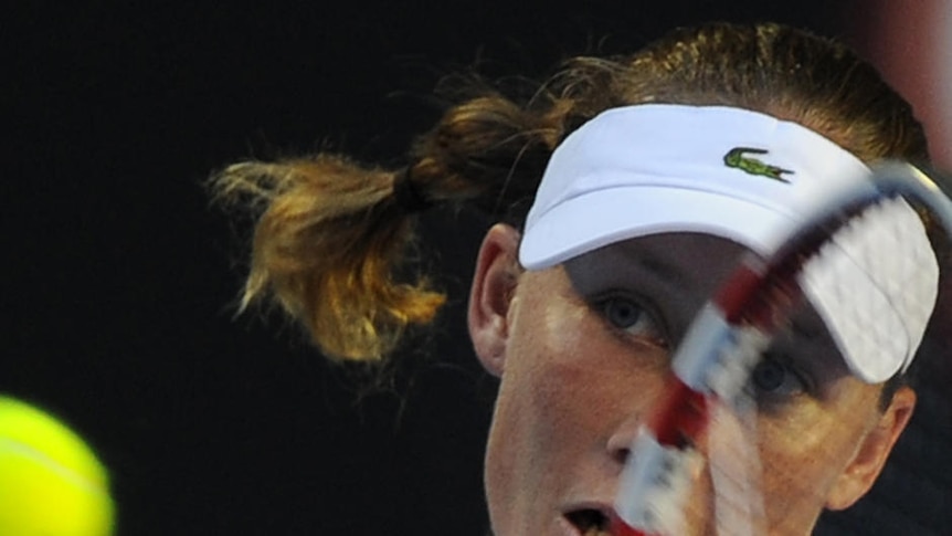 On a roll: Samantha Stosur blasts past Vera Dushevina.