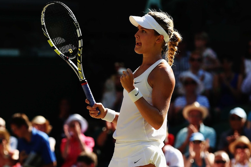Canada's Eugenie Bouchard celebrates winning her Wimbledon semi-final against Simona Halep
