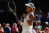 Canada's Eugenie Bouchard celebrates winning her Wimbledon semi-final on July 3, 2014.