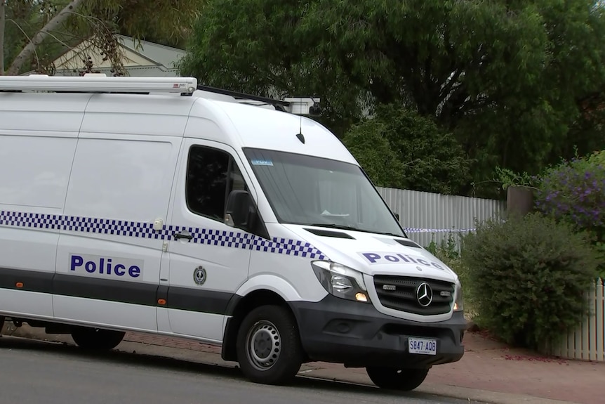  A police van parked on a street