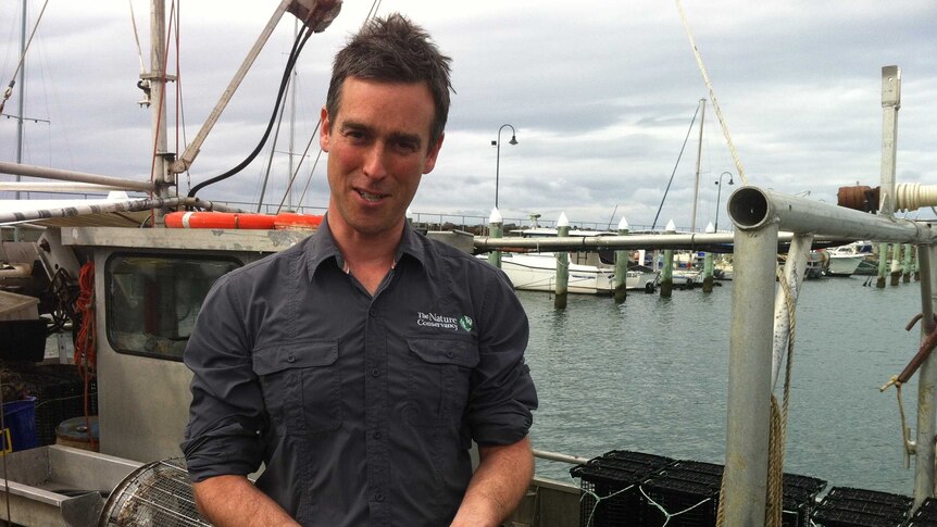 James Fitzsimons The Nature Conservancy with Angasi oysters