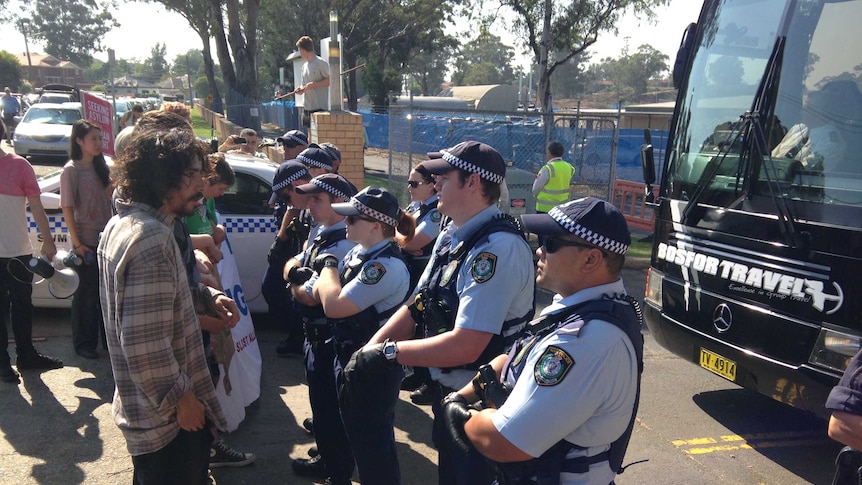 Police face off against protesters at the Villawood Detention Centre in Sydney's west on April 3, 2014.