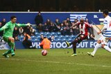 Sheffield United's Jamal Campbell-Ryce scores in the FA Cup match against QPR on January 4, 2015.