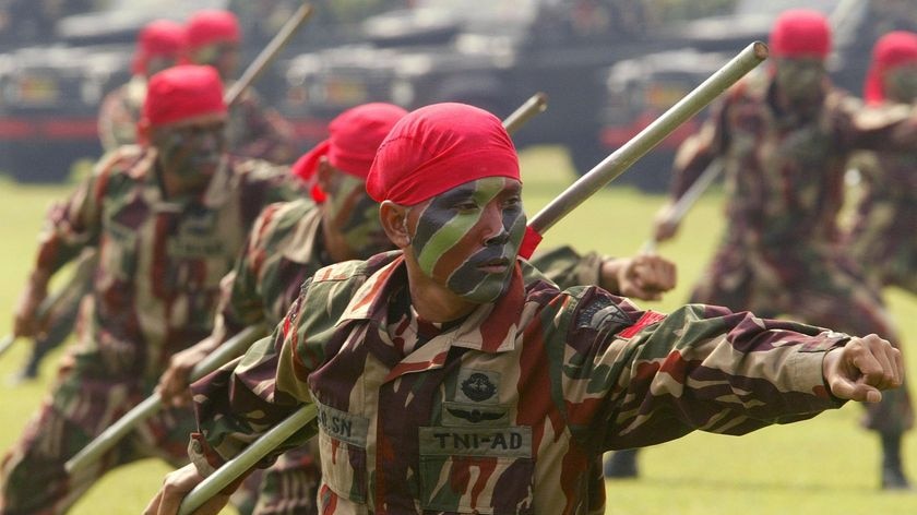 Indonesian soldiers from Kopassus special forces perform at a ceremony in Jakarta