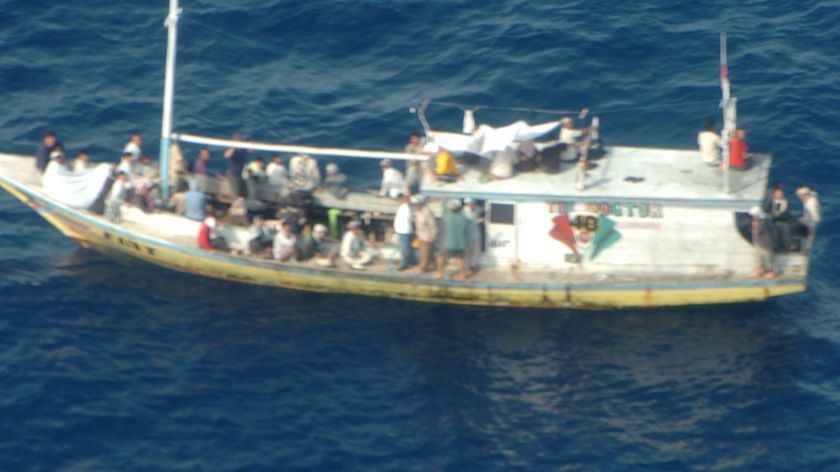 The boat carrying 54 passengers and two crew was intercepted by HMAS Albany yesterday.