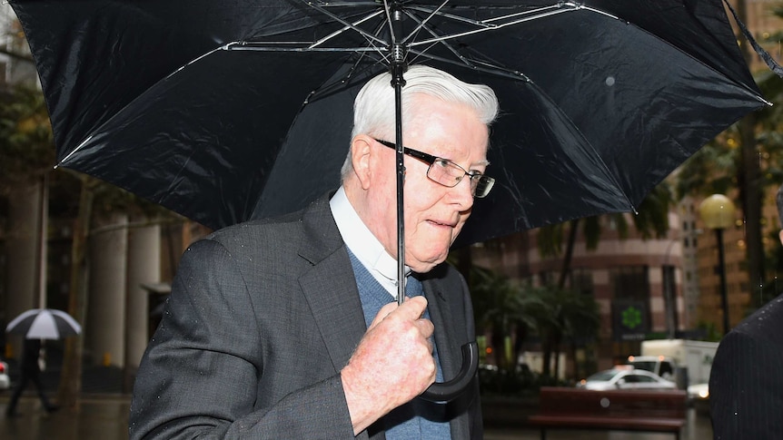 Bishop Robinson walks into child abuse royal commission