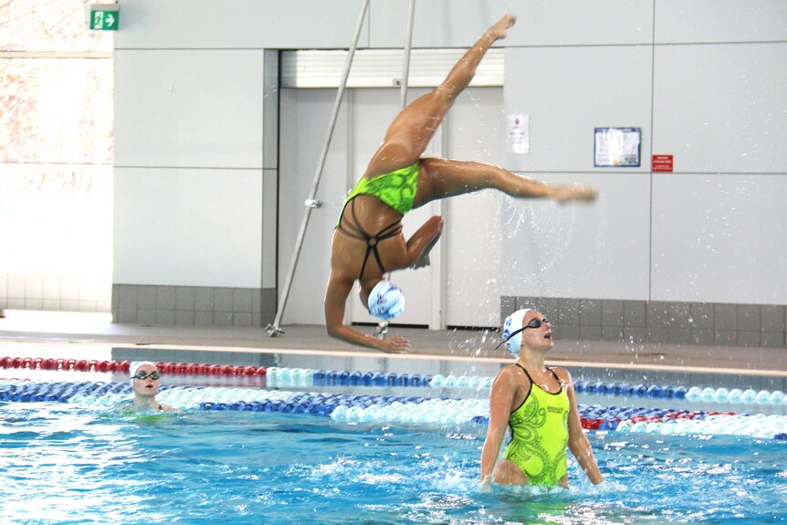 A jump as part of the free routine by the team.