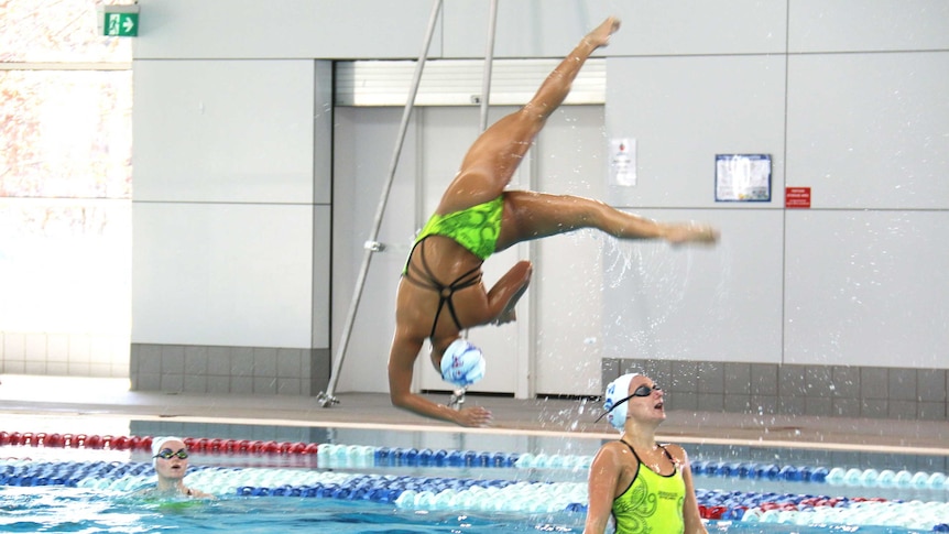 A jump as part of the free routine by the team.